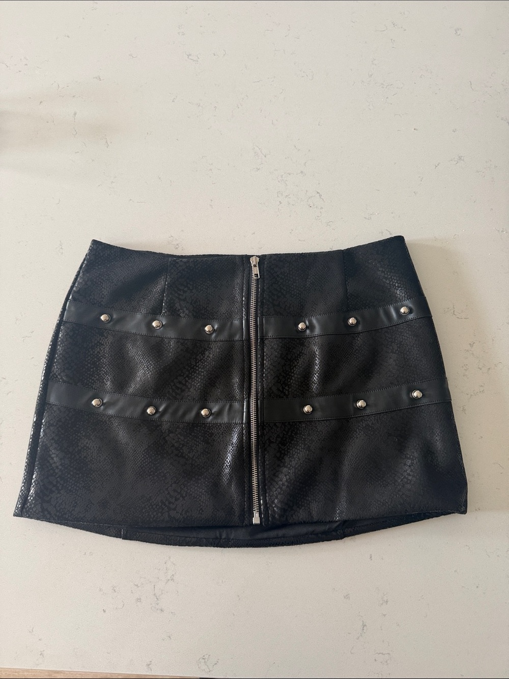 AKIRA Black faux leather studded mini skirt M
